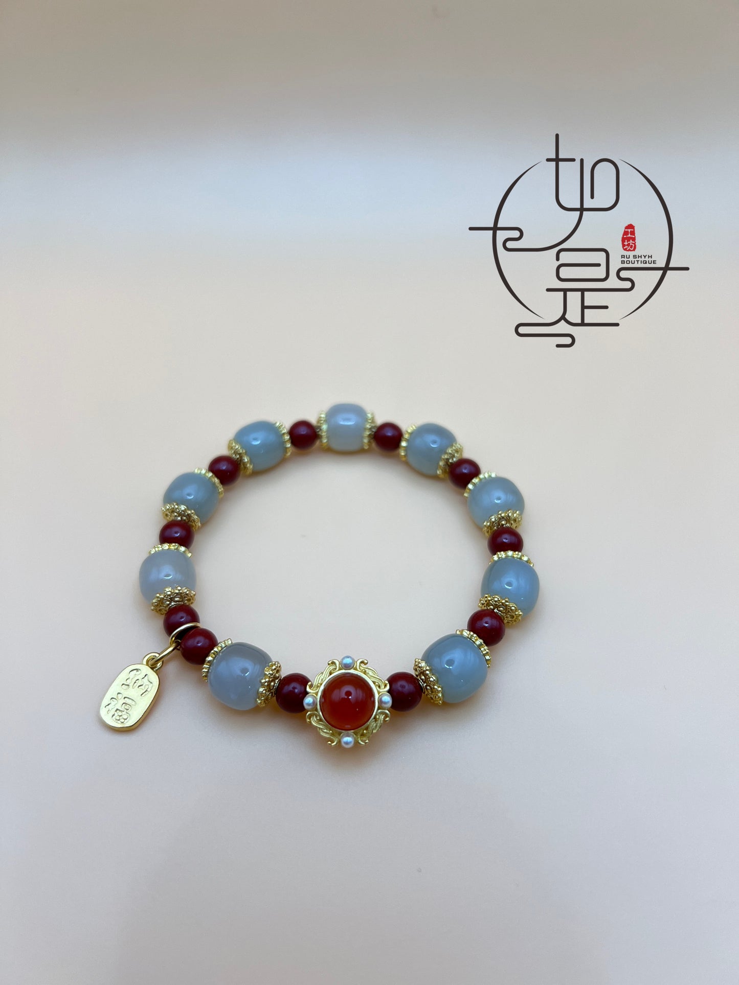 Hetian jade and cinnabar beaded bracelet